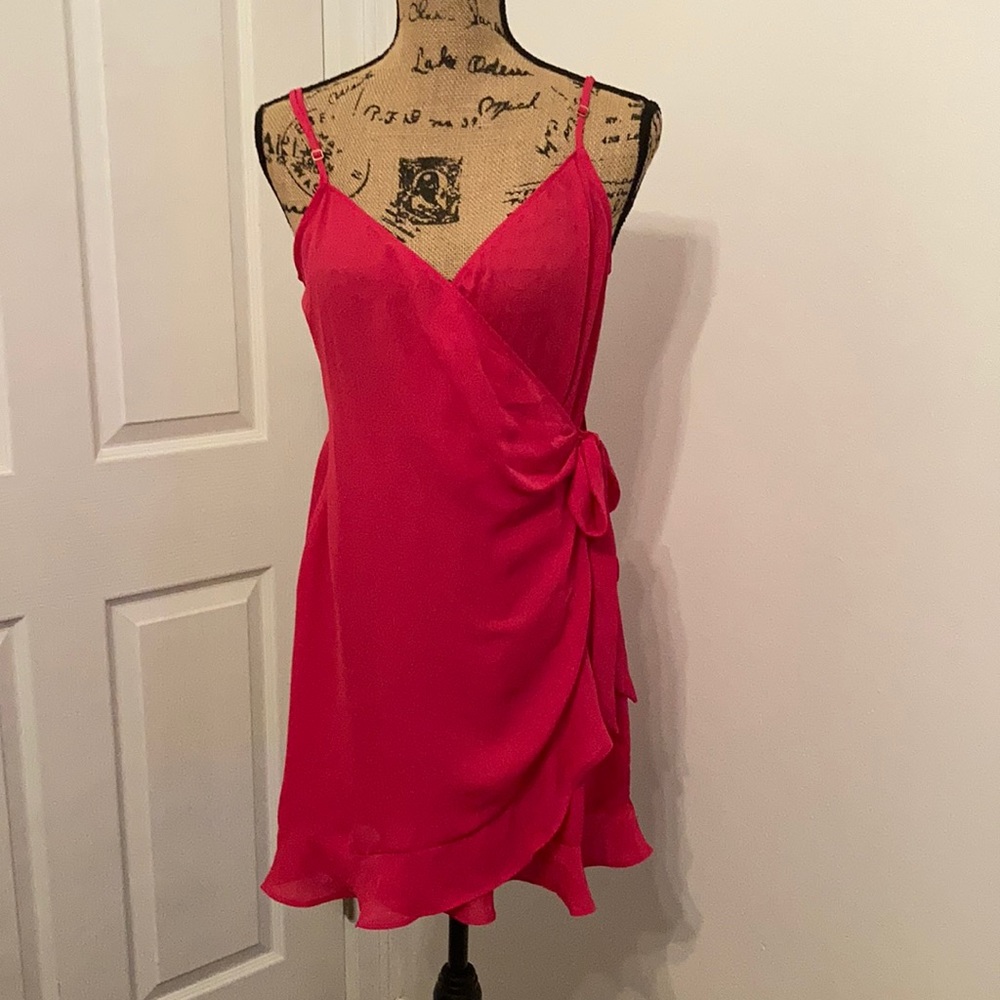 Hot pink wrap dress with ruffle detail
